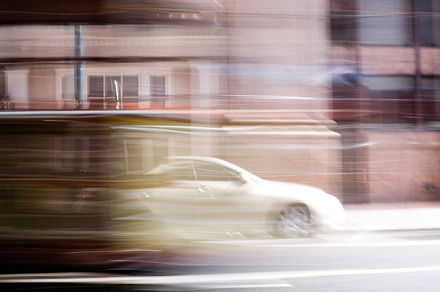 Moving Car and Train Color Image
