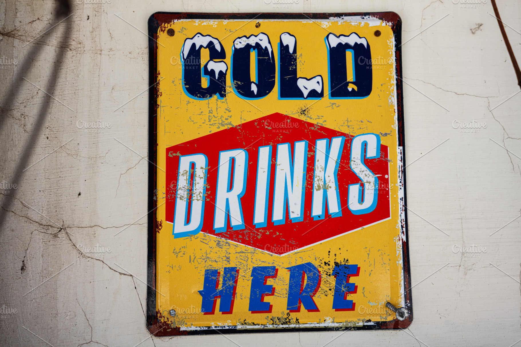 Vintage advertising sign promoting cold drinks currently, a Photo by AS photostudio