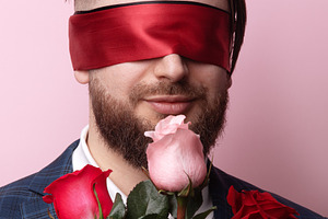 Blindfolded Man with Roses, a Person Photo by Ales Munt