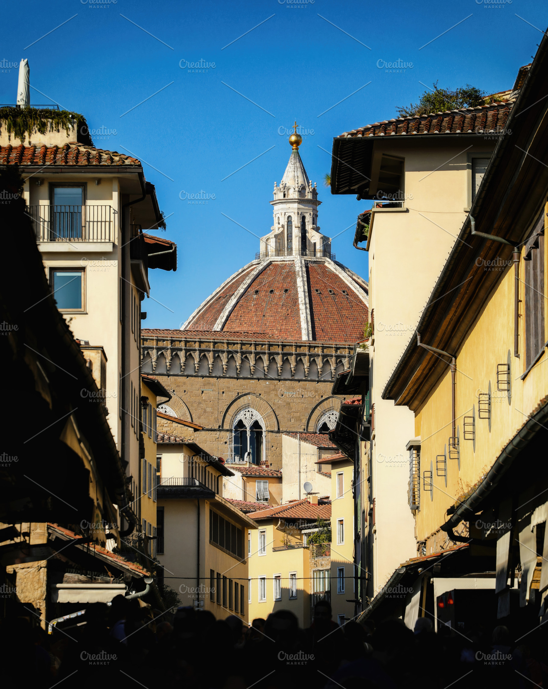 Brunelleschi's Dome rising above Ponte Vecchio in Florence, an Architecture Photo by Antonio Gravante Market