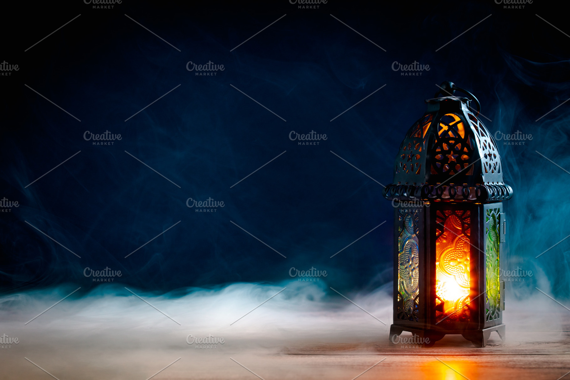 Arabic Ramadan lantern glowing at night. Muslim Holy Month Ramadan Kareem, Eid, a Holiday Photo by photoguns
