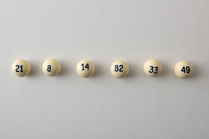 Six Numbered Lottery Balls in a Row, a Sports & Recreation Photo by Davizro's Market