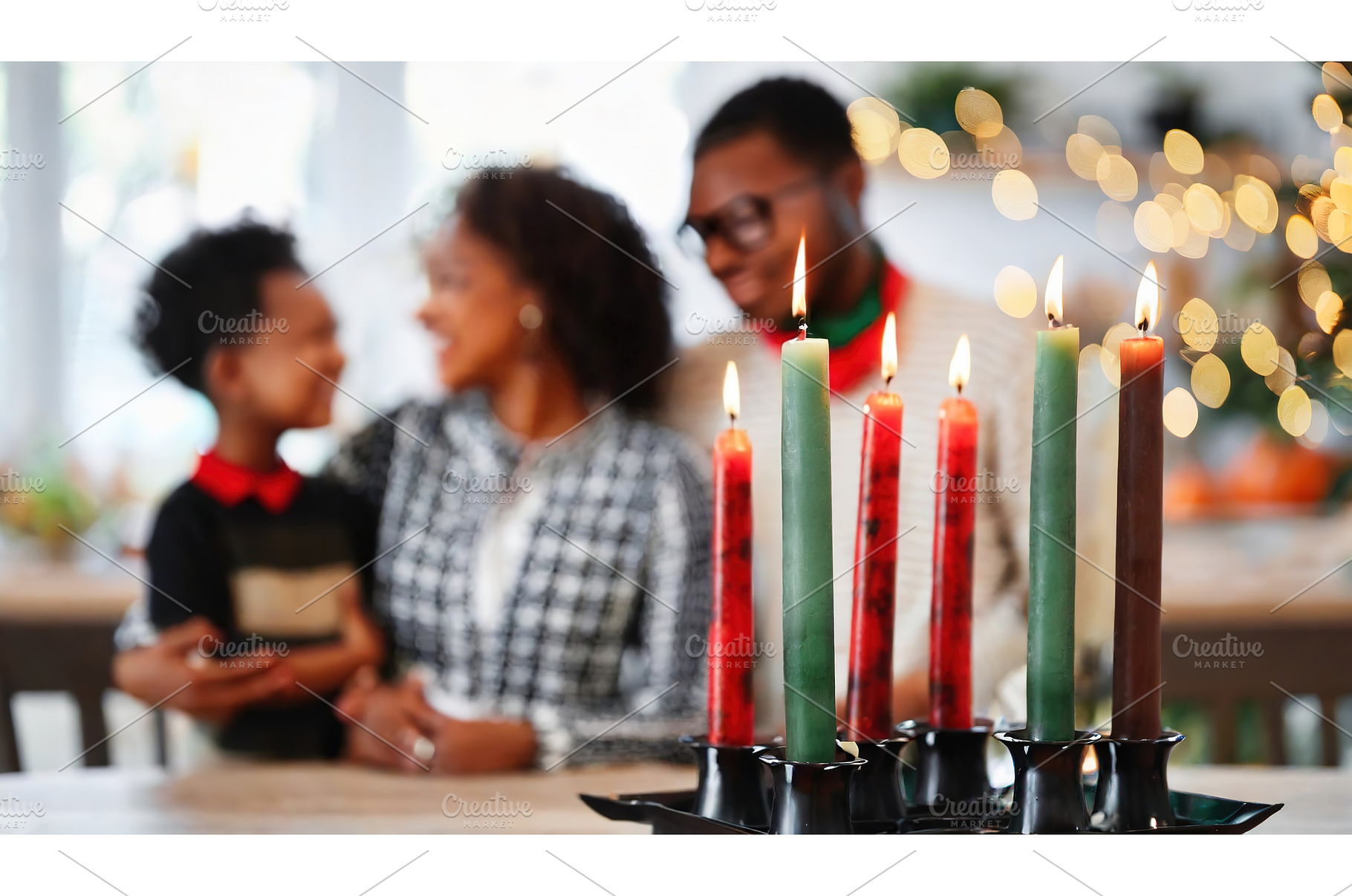 Family gathering around a festive, a Holiday Photo by Igor Tichonow