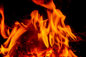 Open fire abstraction on a dark background