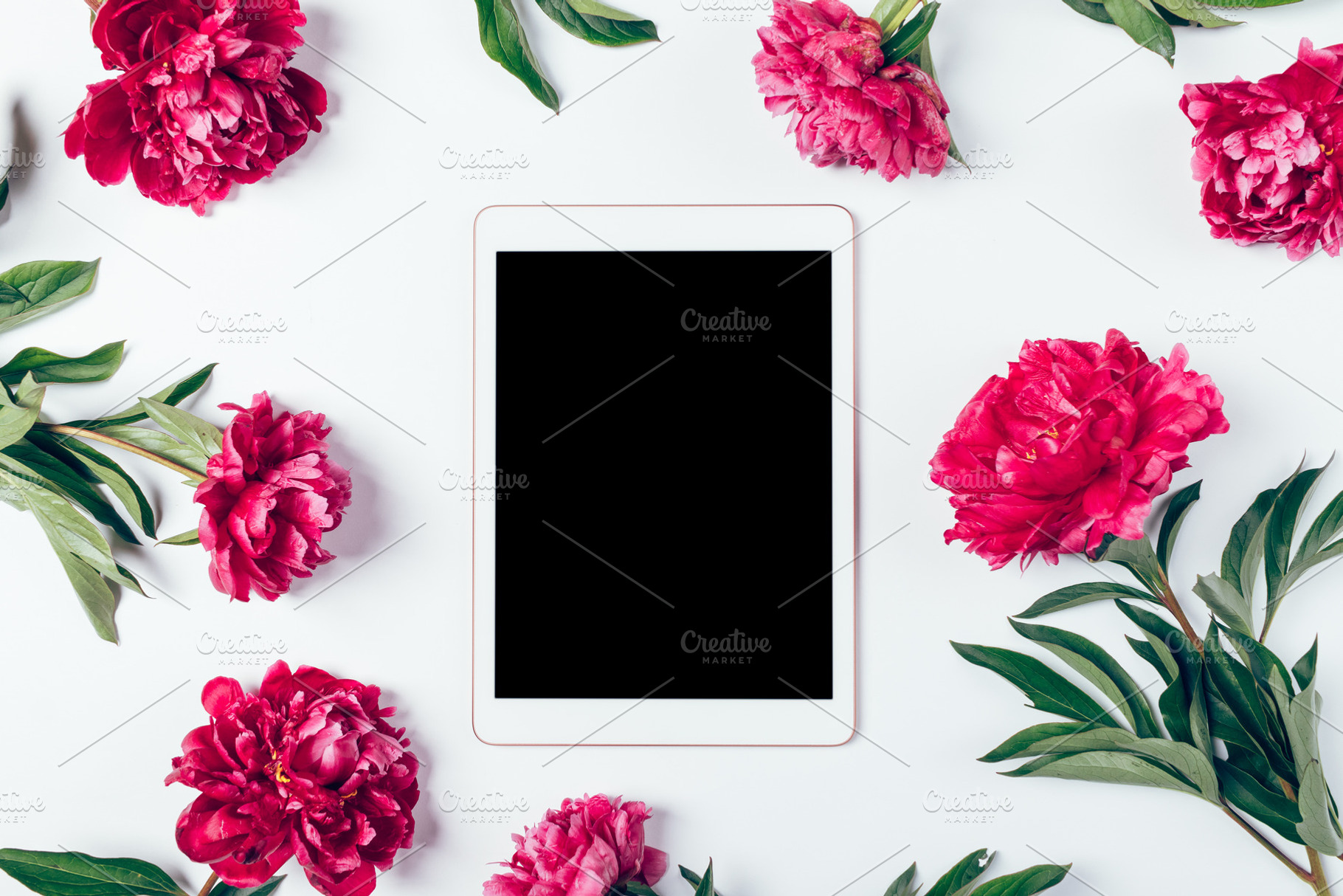 Digital tablet with blank screen among beautiful fresh pink peon, a Technology Photo by progressman