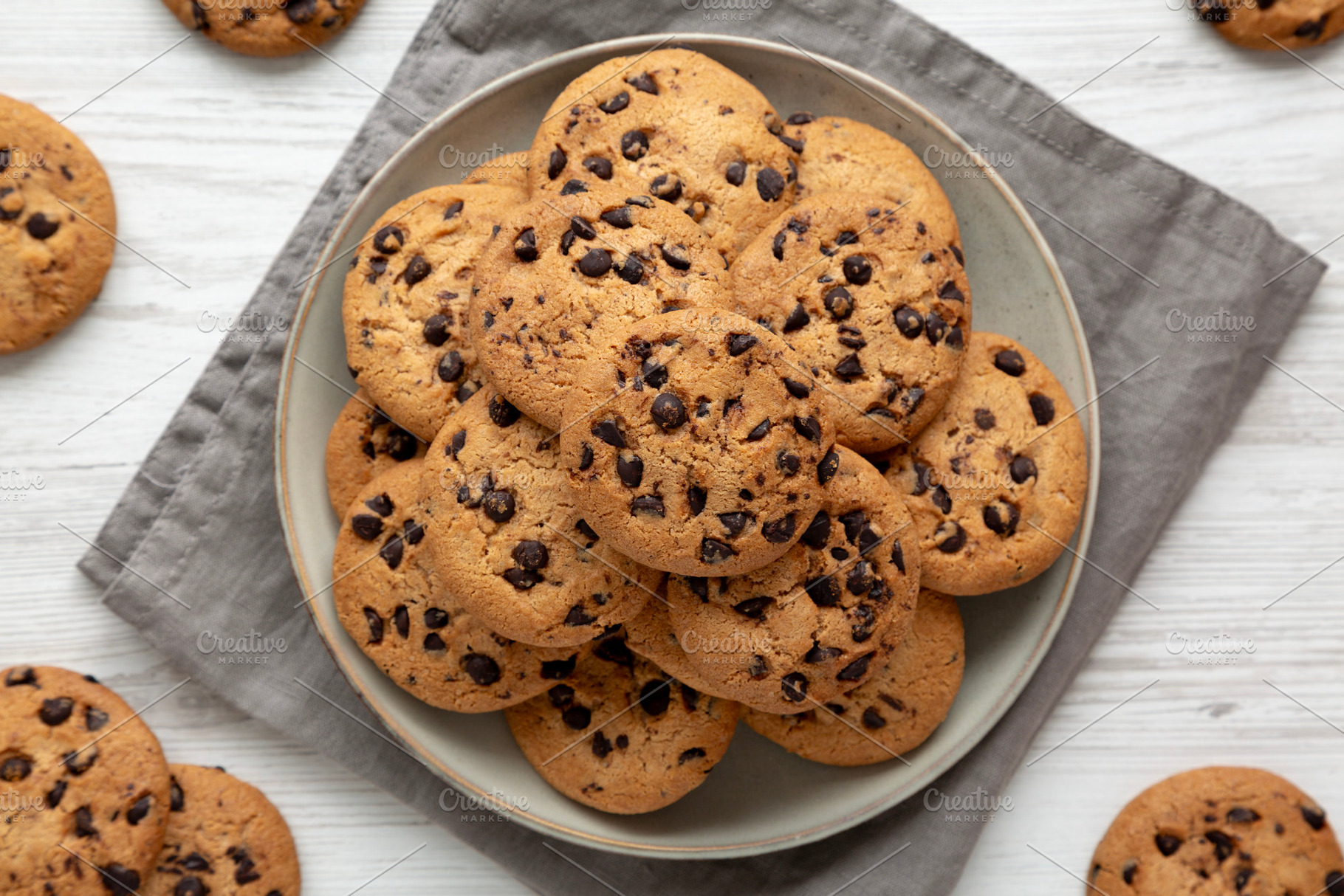 Homemade Chocolate Chip Cookies on a Plate, top view., a Food & Drink Photo by LiudmylaChuhunova