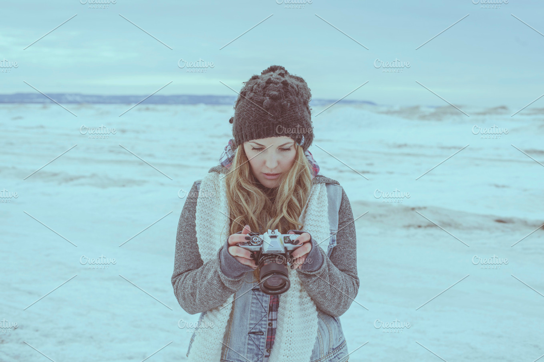 Woman with camera containing blonde hair, vintage camera, and beautiful, a Person Photo by ZedProMedia