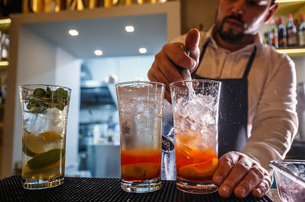 Bartender featuring cocktail, vodka, and gin, a Person Photo by Grafvision photography
