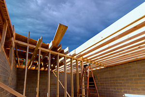 Construction work on wooden roof