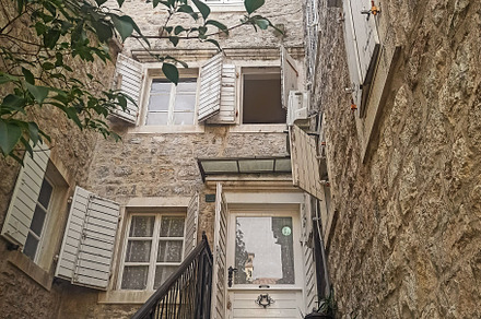 Beautiful narrow street with lantern, an Architecture Photo by Photo by YuraYaryna