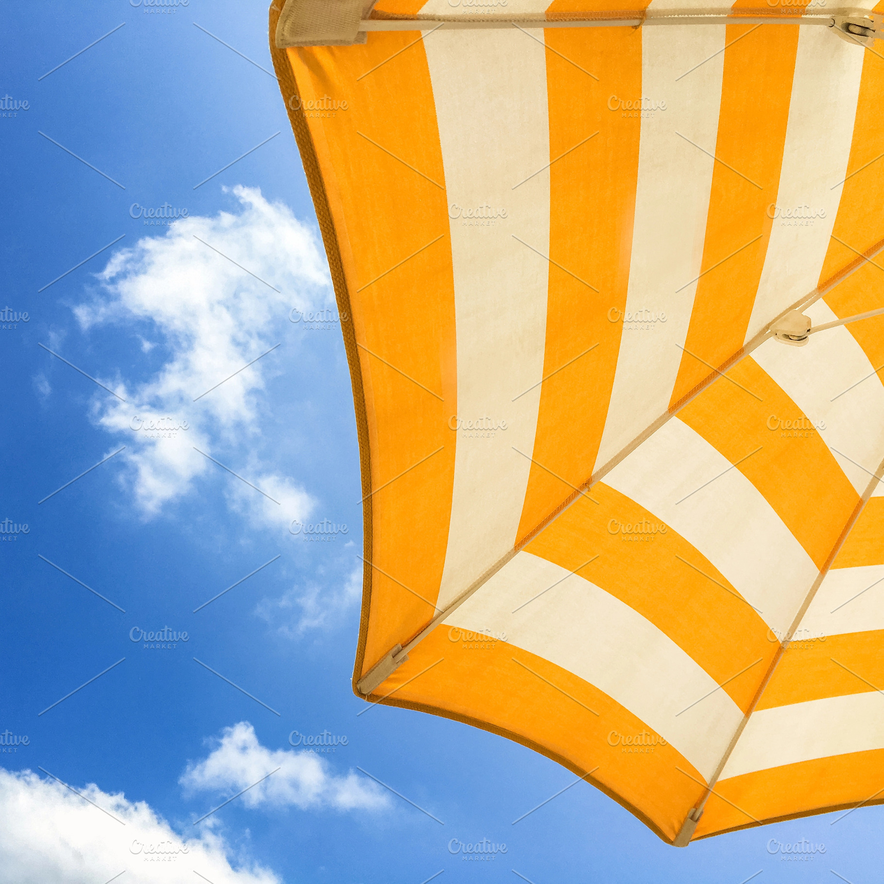 Parasol and sky, a Wallpaper Photo by KYNA STUDIO
