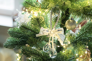 Christmas tree decorating with festive silver and crystal orname, a Holiday Photo by Olena Rudo