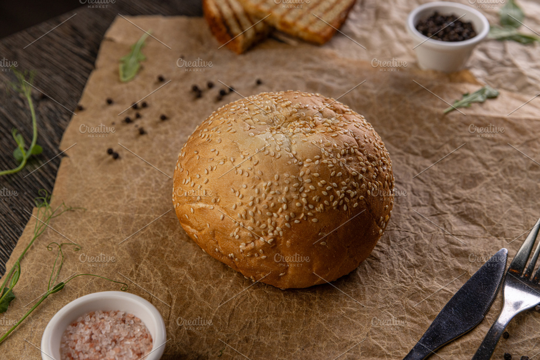 Round sesame seed bun, a Photo by Grafvision photography