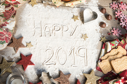 Happy 2019 text made with flour containing 2019, background, and bakery