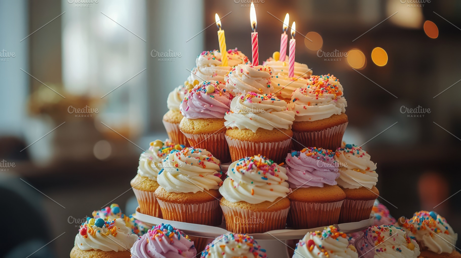 Colorful cupcake tower adorned with, a Background Photo by Pixeness