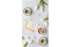 Save the Date card on marble, an Abstract Photo by tilialucida