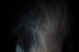Dust cloud on black background