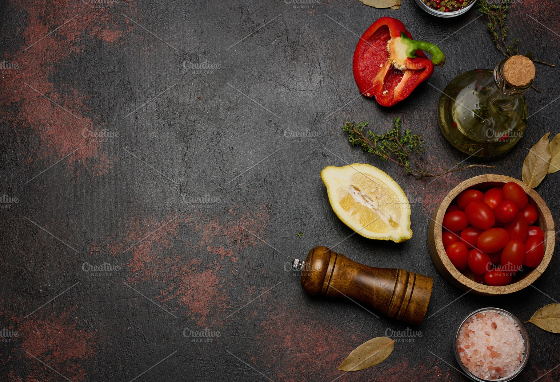 Cherry tomatoes, red bell pepper halves, lemon, thyme sprigs, an, a Food & Drink Photo by ndanko