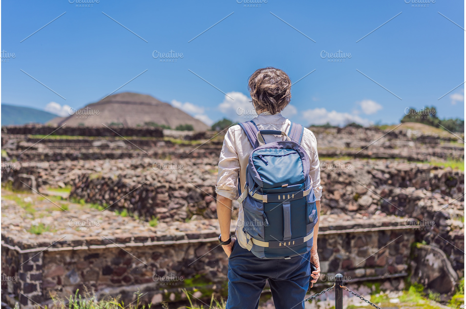 Male tourist posing in front of the, a Holiday Photo by Elizaveta Galitskaya