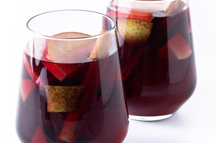 Autumn sangria with pear and apple isolated on white background, a Food & Drink Photo by etorres69