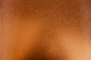 Copper hammered metal. Background texture, a Texture Graphic by GoodGoods