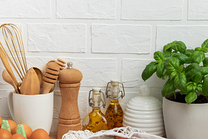 Cherry tomatoes, basil and eggs resting on kitchen counter, embo, a Food & Drink Photo by Olena Rudo