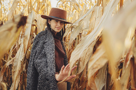 Woman in autumn corn field, a Person Photo by Sonjachni