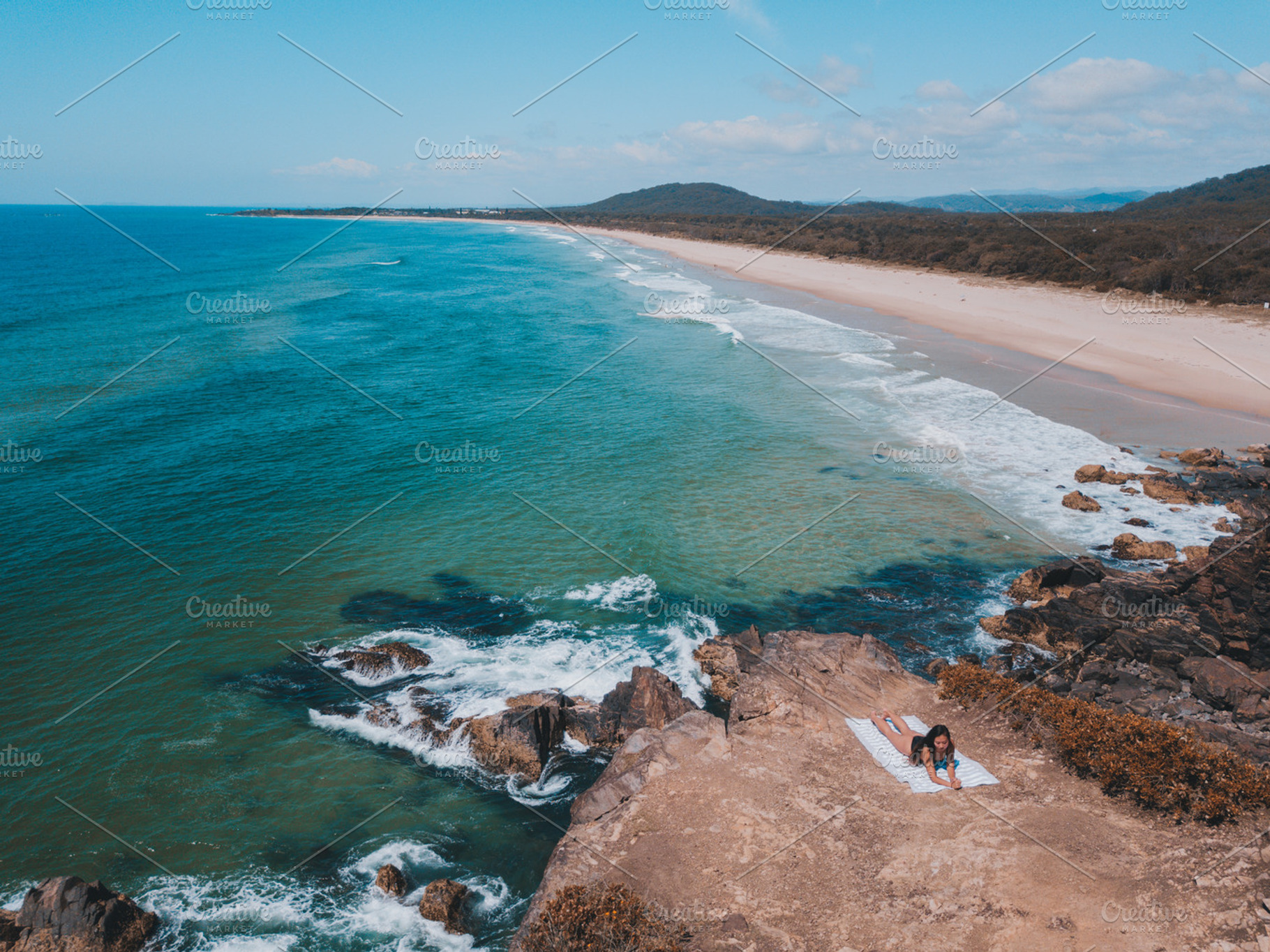 Tanning on cliff near beach, a Nature Photo by Chris Joel Campbell