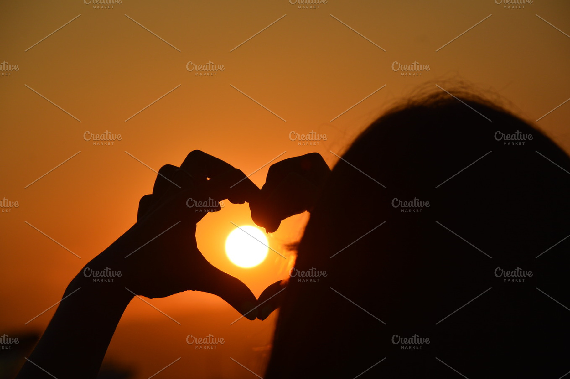 Sunset heart containing evening, fun, and hand
