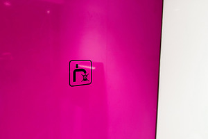 Bright magenta wall with no tap sign modern minimal signage in Paris, France, v, a Photo by AS photostudio