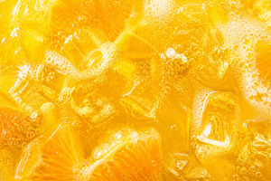 Orange juice with ice and bubbles as, a Photo by Dvoevnore photos