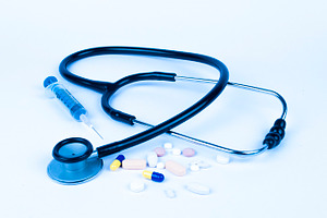Drugs with syringe and stethoscope