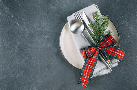 New Year's festive table setting with cutlery and decorations. Top view, flat l, a Holiday Photo by Anikona