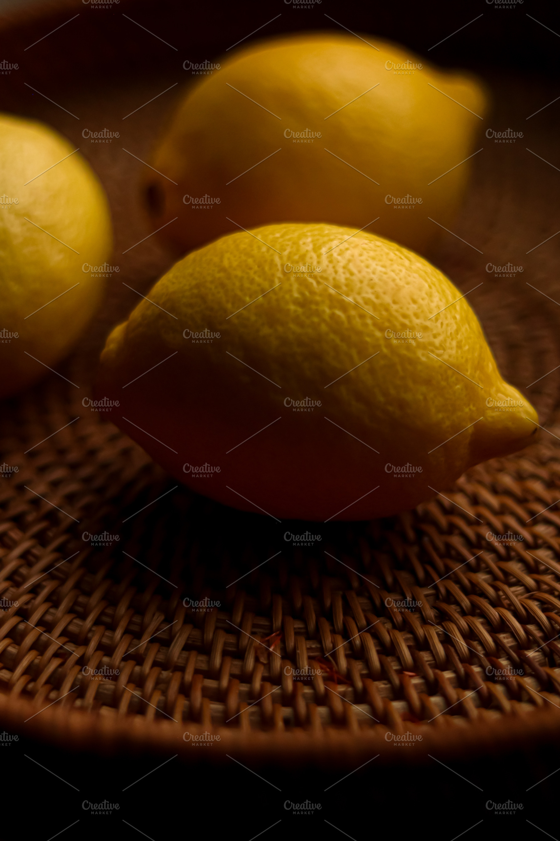 Fresh yellow lemons glowing in soft light, offering a healthy and refreshing ci, a Photo by Studio ANNA