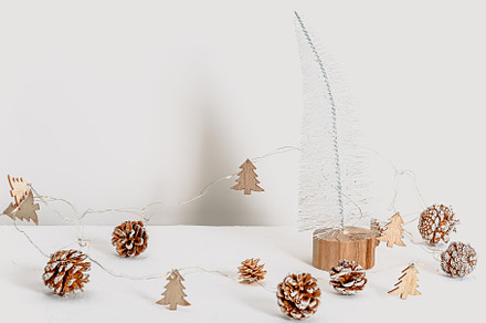 Minimalistic eco friendly scandinavian christmas background in white colors. Pl