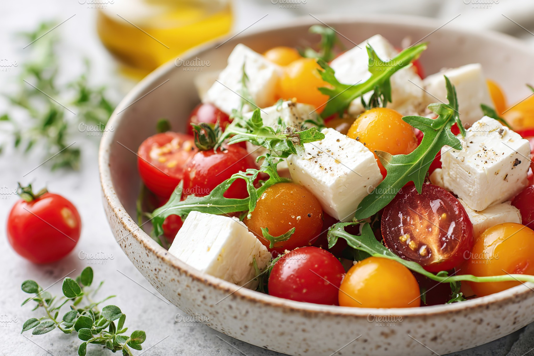 Fresh summer salad with cherry tomatoes and feta cheese for a healthy meal, a Food & Drink Photo by AlyaAnd