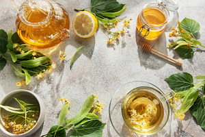 Linden tea preparing with fresh lime blossom and honey, a Food & Drink Photo by Olena Rudo