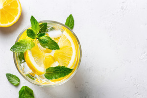 Refreshing lime drink with mint and ice, a Food & Drink Photo by AlyaAnd