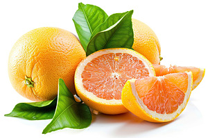 Fresh and tasty grapefruits with green leaves on white background, a Food & Drink Photo by AlyaAnd