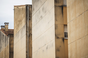 Yellow apartment facades close-up, an Architecture Photo by SkyNext