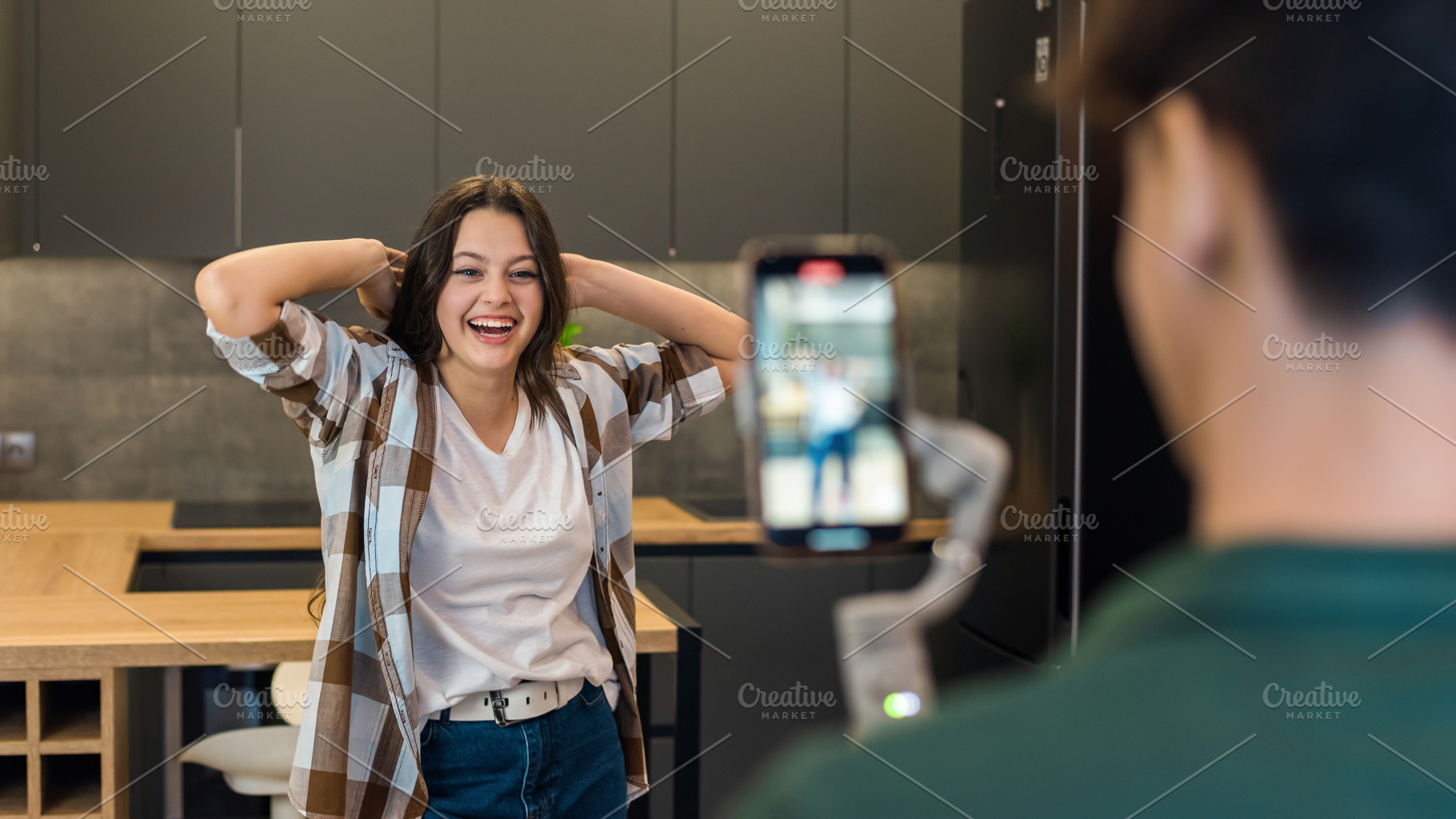 A person recording blogger influence, a Person Photo by frimufilms