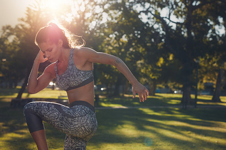 Fitness woman warming up stock photo containing action and activity, a Sports & Recreation Photo by Jacob Lund