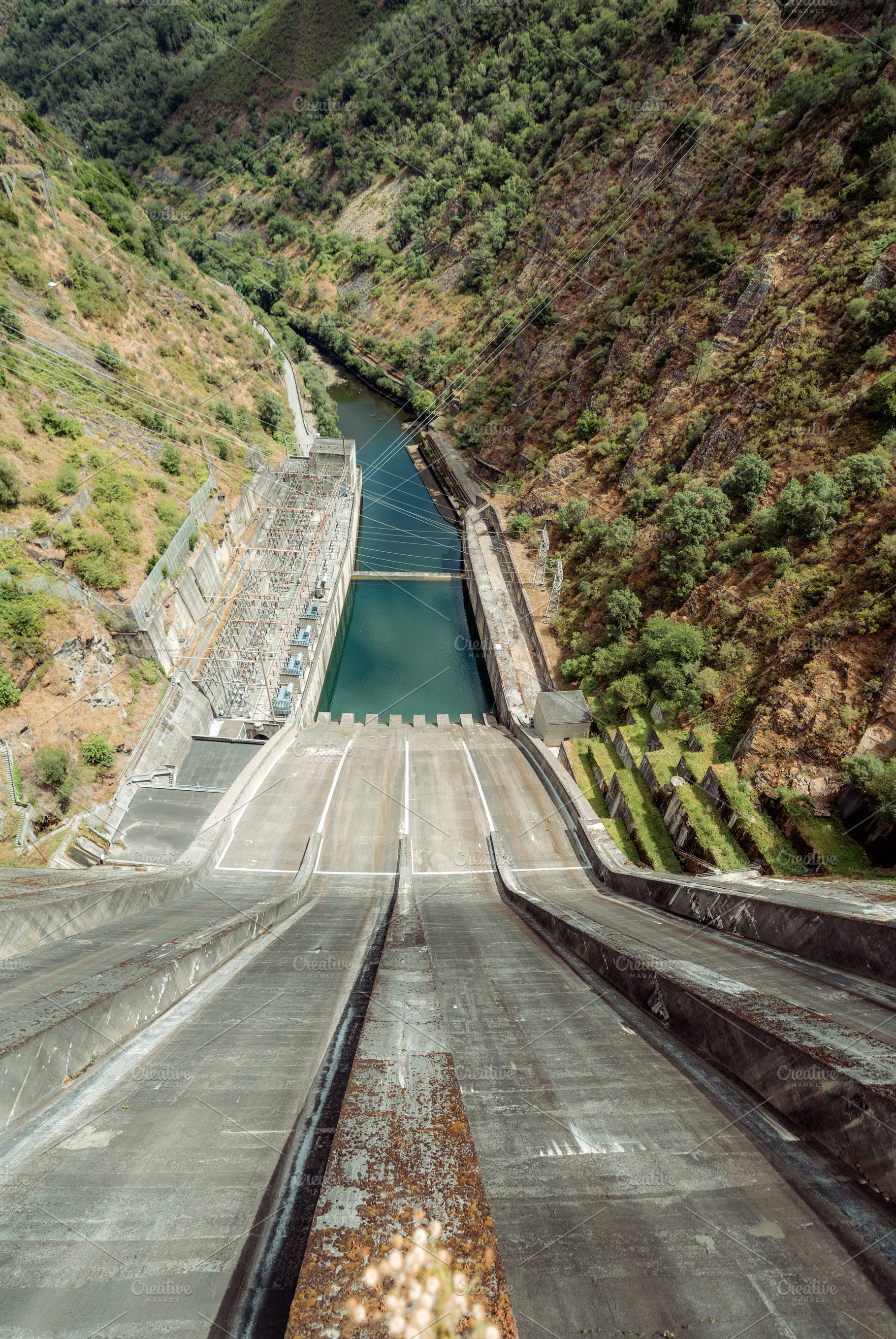 Steep concrete dam spillway, an Industrial Photo by SkyNext
