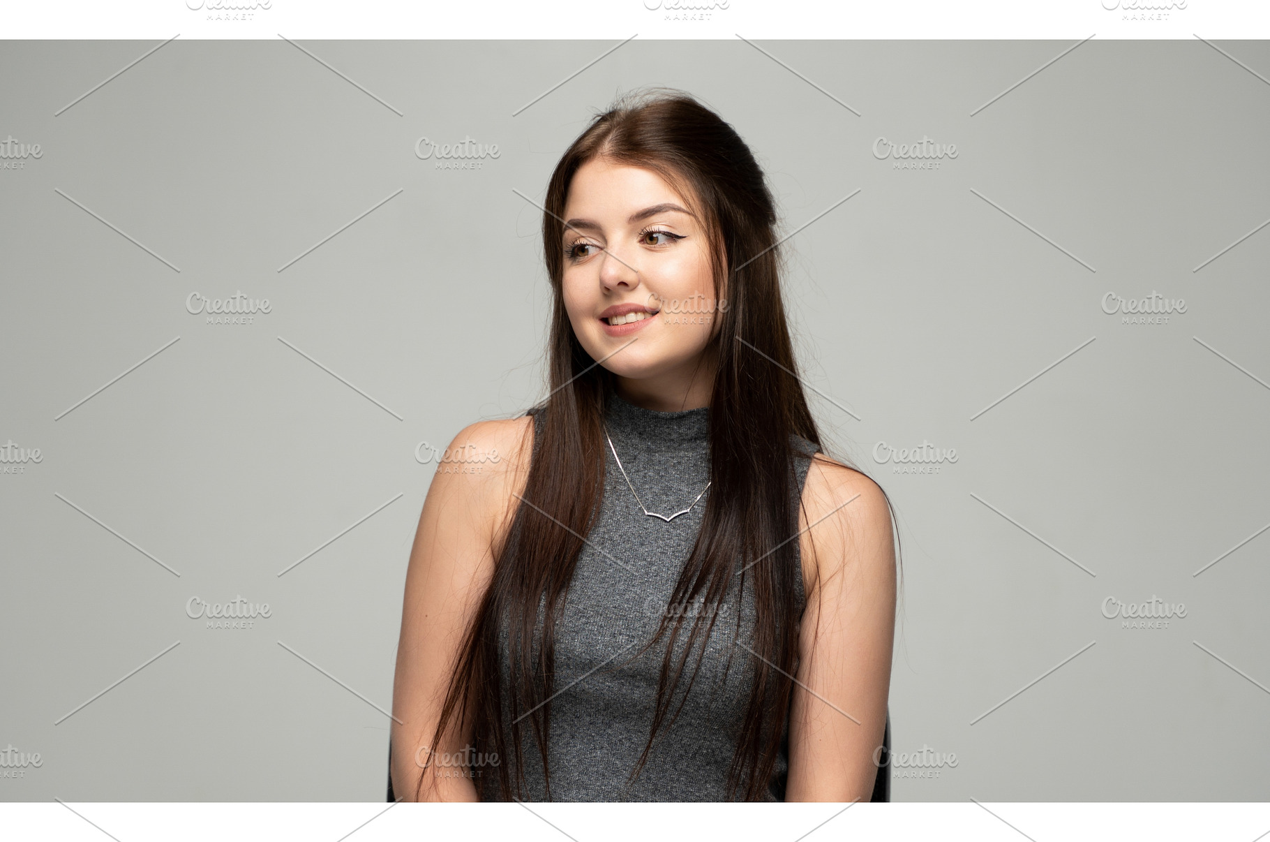 Young brunette woman looking away, a Person Photo by volodymyrshtun13795