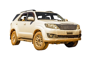 Isolated image of white suv with muddy exterior, a Transportation Photo by DanFLCreativo
