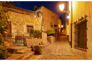 Night street in old town of Tossa de, an Architecture Photo by kavalenkava