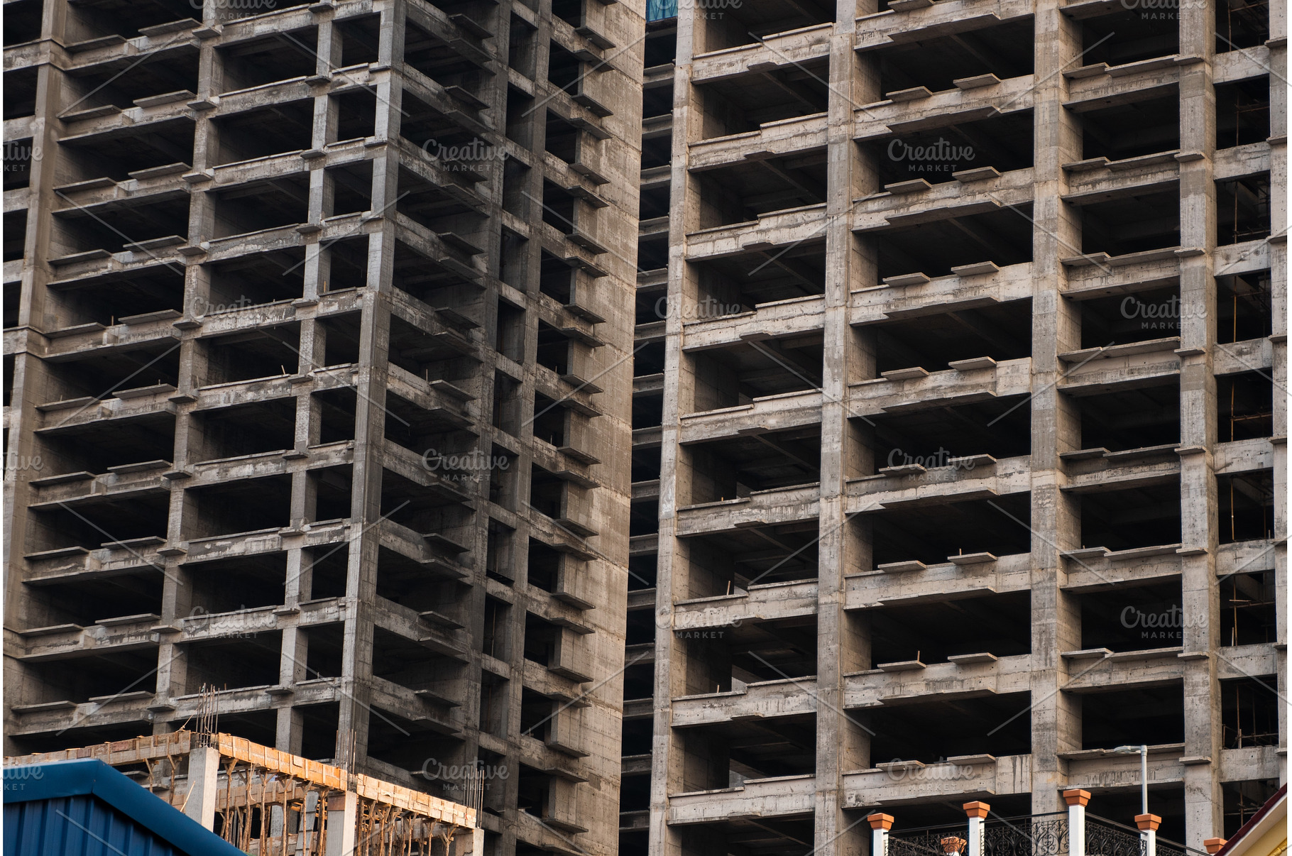 Vertical view of high-rise concrete, an Industrial Photo by volodymyrshtun13795