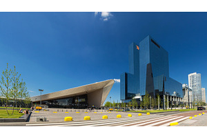 ROTTERDAM, NETHERLANDS - JUNE 08: Skyscrapers and Central railwa, an Architecture Photo by Leonid Andronov