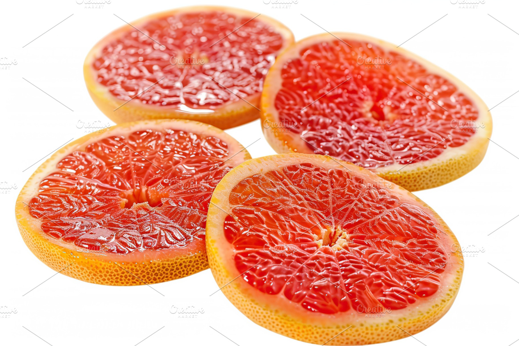 Fresh sliced grapefruits on white background, a Food & Drink Photo by AlyaAnd