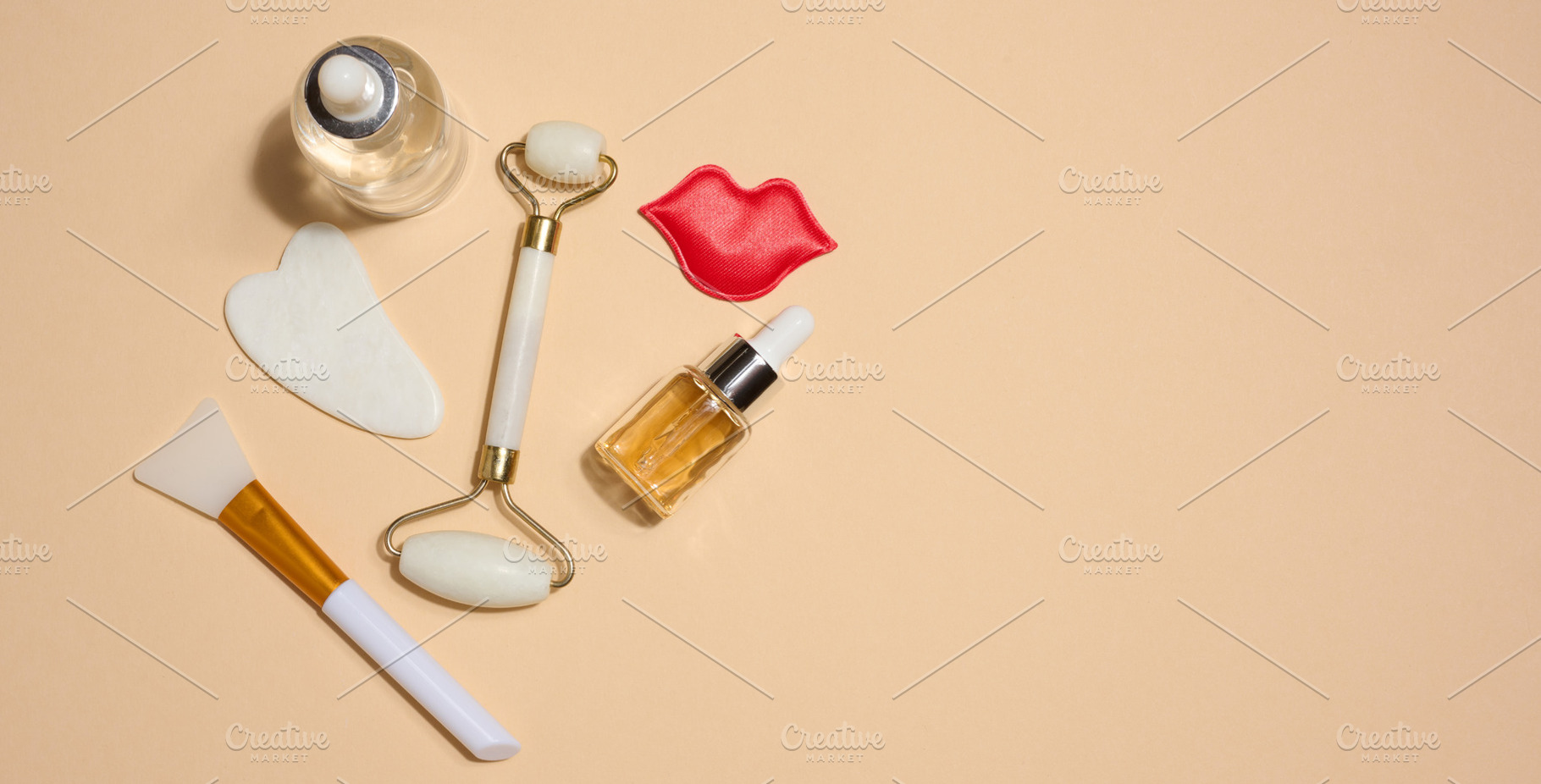 Set of cosmetics and skin care tools including facial massagers,, a Health & Medical Photo by ndanko